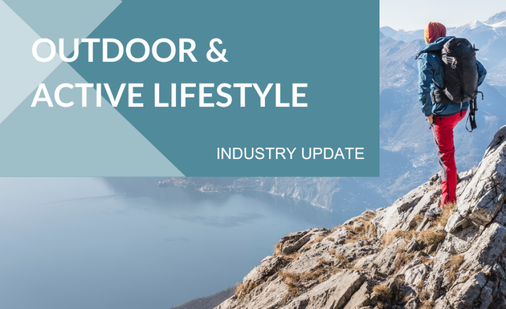 Cover image for Outdoor and Active M&A Update - A mountain climber in the background